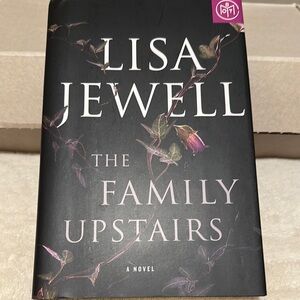 The Family Upstairs Hardcover Book